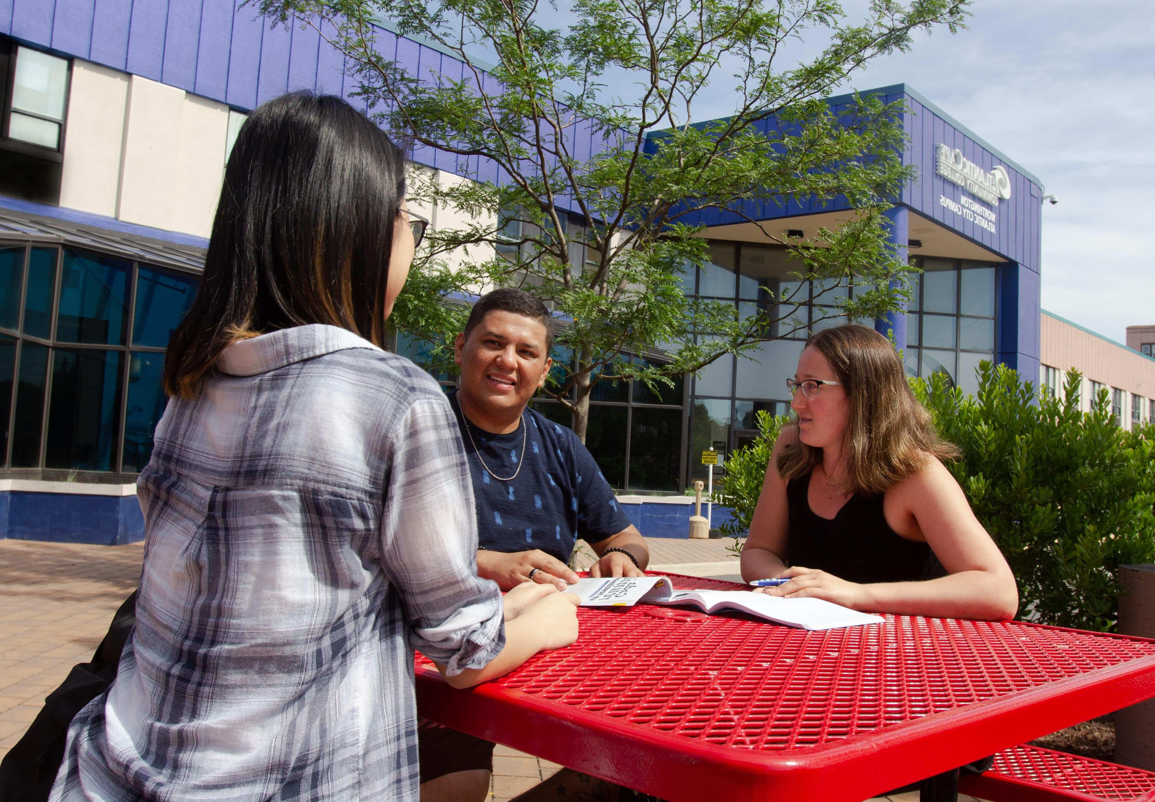 pictures of students in front of AC Campus